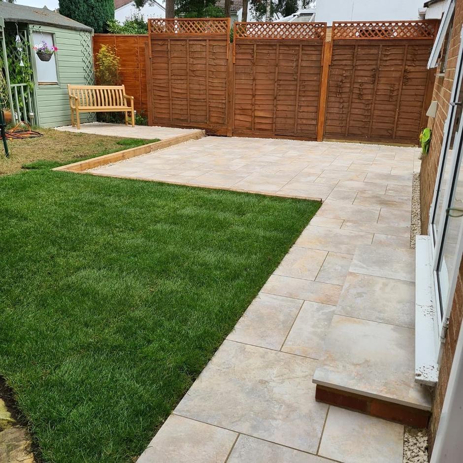 porcelain paving with grass in garden